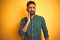 Young indian businessman wearing elegant shirt standing over isolated white background touching mouth with hand with painful Royalty Free Stock Photo