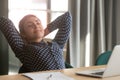 Millennial young indian woman relaxing after hard working day Royalty Free Stock Photo