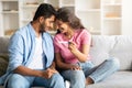 Indian couple smiling with positive pregnancy test Royalty Free Stock Photo