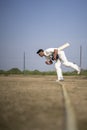 Young Indian cricketer entering in the cricket field. Indian cricket and sports concept