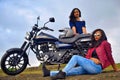 Young Indian girls posing on motorcycle, Pune Royalty Free Stock Photo