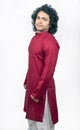 Young indian male model wearing red kurta