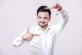 Young indian man making frame with hand Royalty Free Stock Photo