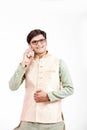 Young Indian man talking on mobile phone Royalty Free Stock Photo