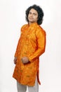 Young indian model wearing orange kurta Royalty Free Stock Photo