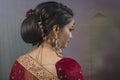 Young Indian woman in bridal wear