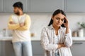 Young indian woman touching her head, have fight with husband Royalty Free Stock Photo