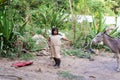 Young indigenous boy with a donkey