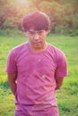 Young Indonesian Man Posing In Pink Shirt