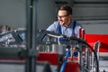 Industrial machine operator working in factory. Royalty Free Stock Photo