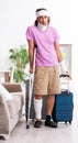 Young injured man preparing for the trip Royalty Free Stock Photo