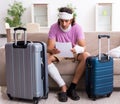 Young injured man preparing for the trip Royalty Free Stock Photo