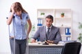 Young injured woman and male lawyer in the courtroom Royalty Free Stock Photo