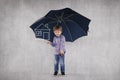 Young insurance agent under umbrellas, protects your property Royalty Free Stock Photo