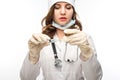 Young girl nurse in glasses prepares syringe Royalty Free Stock Photo