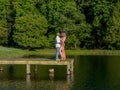 A Beautiful Young Interracial Couple Pose For Their Engagement Photographs Outdoors Royalty Free Stock Photo