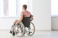 Young invalid man in empty room Royalty Free Stock Photo