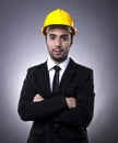 Young investor with construction helmet