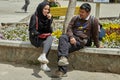 Young Iranian couple on date in park, Tehran, Iran.