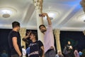 Young Iranian men take photos near Tomb poet Hafez, Shiraz.