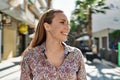 young irish girl smiling happy standing at the city