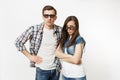 Young irritated dissatisfied couple, woman and man in 3d glasses and casual clothes watching movie film on date, keeping