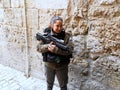 Young Israeli woman soldier on the walls of the old Jerusalem