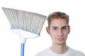 Young Janitor Smiling with Broom