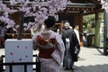 Young Japanese Couple Dressed In Traditional Kimonos At Senso-ji Temple