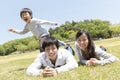 Young Japanese family enjoying in the park