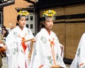 Young Japanese girls dressed and miko shinto pristesses
