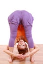 Young Japanese Woman Doing YOGA standing forward bend Royalty Free Stock Photo