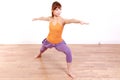 Young Japanese Woman Doing YOGA warrior 2 pose Royalty Free Stock Photo