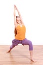 Young Japanese Woman Doing YOGA warrior 1 pose Royalty Free Stock Photo