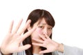 Young Japanese woman making stop gesture Royalty Free Stock Photo