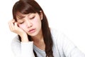 Young Japanese Woman Sleeping on the Table Royalty Free Stock Photo