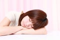 Young Japanese Woman Sleeping on the Table Royalty Free Stock Photo
