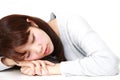 Young Japanese Woman Sleeping on the Table Royalty Free Stock Photo