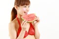 Young Japanese woman wearing bikini with watermelon