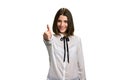 Young joyful woman gesturing thumb up. Royalty Free Stock Photo