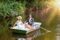 Young just married bride and groom on boat Royalty Free Stock Photo