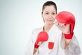 Young karate woman with glowes Royalty Free Stock Photo