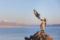 Young kazakh eagle hunter with his golden eagle Royalty Free Stock Photo