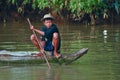 Young khmer boy fishing