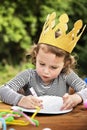 Young kid enjoying painting