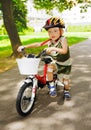 Young kid injured knees learning ride bicycle bike