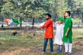 Young kids and boy of different age and different religion hearing tricolor dress and holding Indian National flag. Royalty Free Stock Photo