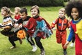 Young kids carving Halloween jack-o`-lanterns Royalty Free Stock Photo