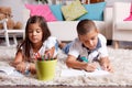 Young kids doing homework at home