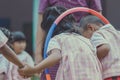 Young Kids exercise with hoola hoop Royalty Free Stock Photo